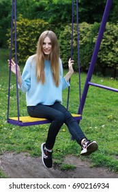 Girl On A Swingset