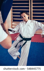 Girl On Tae Kwon Do Training With Trainer