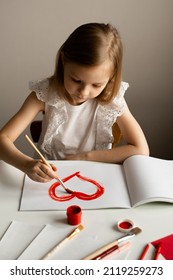 Girl Painting Red Heart Card For Valentines Day On White Table, Crafting, Top View, Copy Space, Love, Valentines Day And Mothers Day Concept, Lifestyle