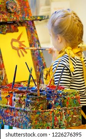 A Girl Paints A Picture In The Children's Art Museum In Manhattan