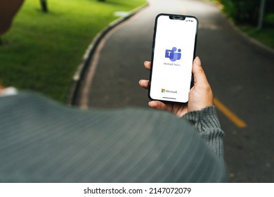 Girl In The Park Holding A Smartphone With Microsoft Teams (Business Communication Platform) App On The Screen. Rio De Janeiro, RJ, Brazil. March 2022.