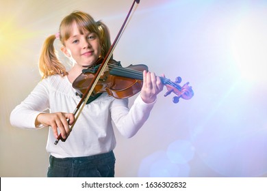 Girl Performing On Stage With Violin. Horizontal Composition. Front View.