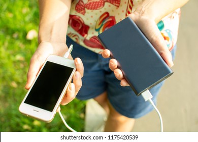 Girl With Phone And Power Bank