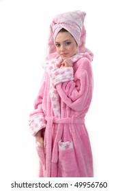 Girl In A Pink Long Dressing Gown On A White Background