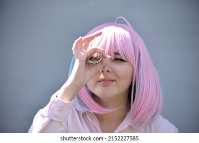 Girl In Pink Shirt And With Pink Color Hair Holding Cash Money Euro And Dollars. Bank Staff Portrait, Anime Hero Cosplay