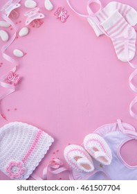 Its a Girl pink theme Baby Shower or Nursery background with decorated borders on pink wood background.