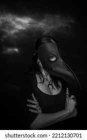 Girl In Plague Doctor Mask Over Dramatic Sky