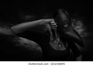 Girl In Plague Doctor Mask Showing Thumbs Down Over Dramatic Sky