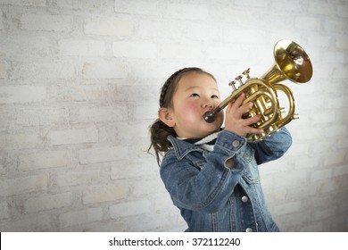 Girl to play the trumpet