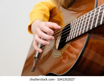 Girl Playing Acustic Guitar, Closeup Shot