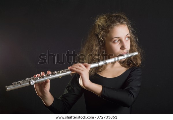 Girl Playing Flute Stock Photo 372733861 | Shutterstock