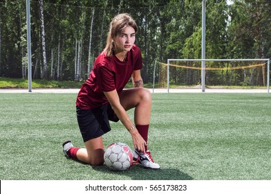 Girl Playing Football