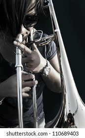 girl playing horn
