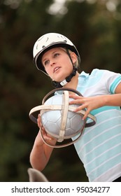 Girl Playing Horseball