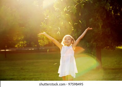 Girl Playing In The Sun