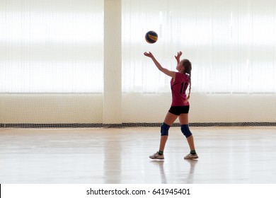 Girl Playing Volleyball In The Sports Club
