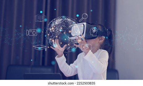 Girl playing with VR glasses. Future technology virtual reality learning media concept. - Powered by Shutterstock