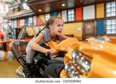 Girl Plays Game Machine, Entertainment Center