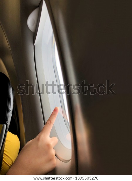 Girl Pointing Finger On Airplane Window Stock Photo Edit