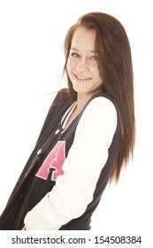 A Girl Is Posing In Her Letterman Jacket.