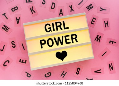 Girl power concept with text on lightbox - Powered by Shutterstock