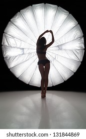 Girl Preparing For Photoshot Near The Giant Reflector