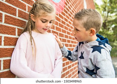 girl problem at school, sitting and consoling child each other