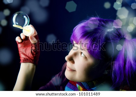 the girl with purple hair, playing with soap bubbles