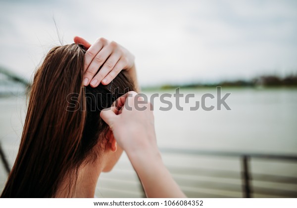 Girl Putting Bobby Pins Hair Outdoors Stock Photo Edit Now