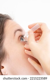 Girl Putting Eye Drops In Her Eyes