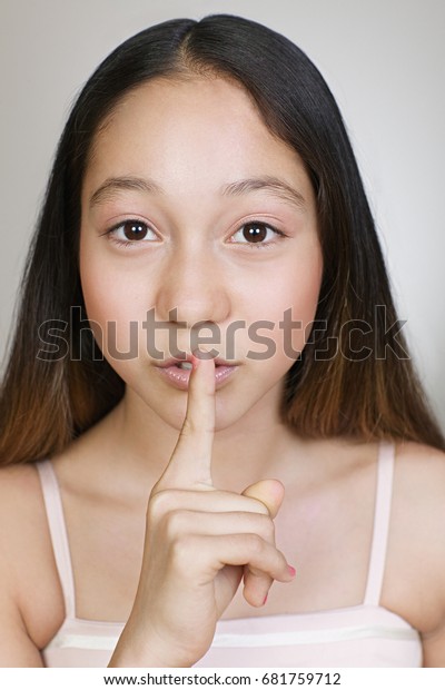 Girl Putting Finger Her Lips Stock Photo Edit Now