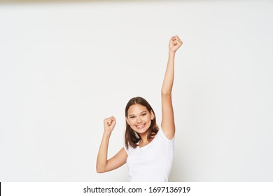 The Girl Raised Her Hand Up On An Isolated Background Cropped View