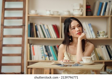 the girl reads in the study - Shutterstock ID 2139796771