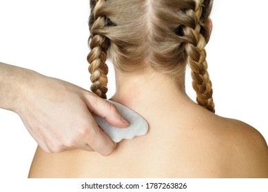 Girl Receiving Gua Sha Treatment On Neck And Back