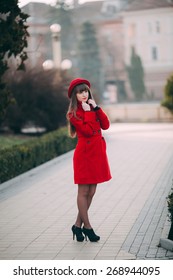 Girl In The Red Coat And Hat