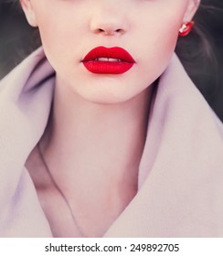 Girl With Red Lips. Photo In Violet Tones