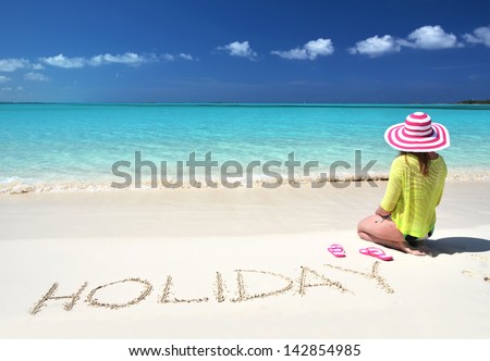 Girl relaxing on the beach of Exuma, Bahamas