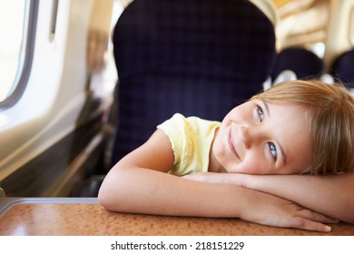 Girl Relaxing On Train Journey