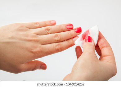 The Girl Removes The Nail Polish With Cotton Wool. Cleaning Nails From Polish