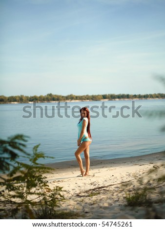 Similar – woman on the beach