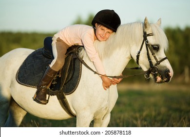 Girl Riding A Horse On Nature