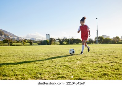 Girl Running On Grass Field, Soccer Fitness To Kick Football And Young Kid Training Energy In Brazil. Strong Healthy Child, Future Athlete Exercise For Goal And Play Outdoor Sports Game Happiness