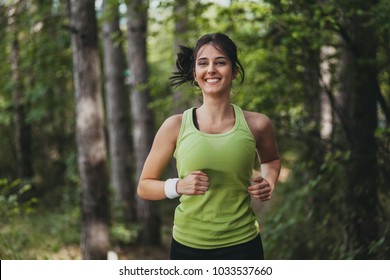 Girl Running In Park In The Morning