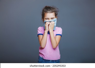 Girl With A Runny Nose Pressed Her Handkerchief To Her Nose