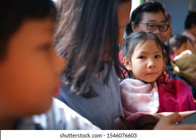 The Girl Sat On The Train With Her Family To Travel.