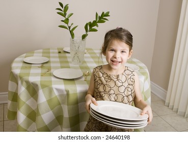 Girl Setting Table