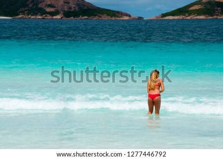 Girl in Shallow Beach Water - Australia
