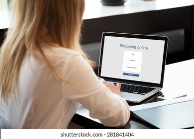 Girl Shopping On-line On Laptop, Using Online Store, Shopping Through Electronic Application, Signing In On Website, Close Up, Rear View