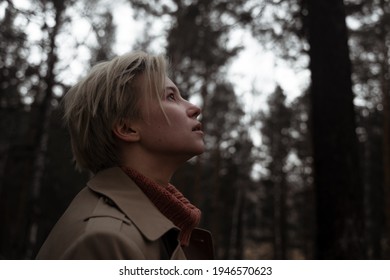 Girl With Short Hair Looks Up, Girl's Profile