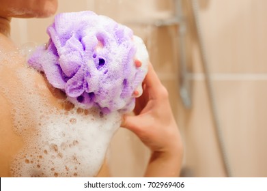 Girl In Shower With Bath Sponge